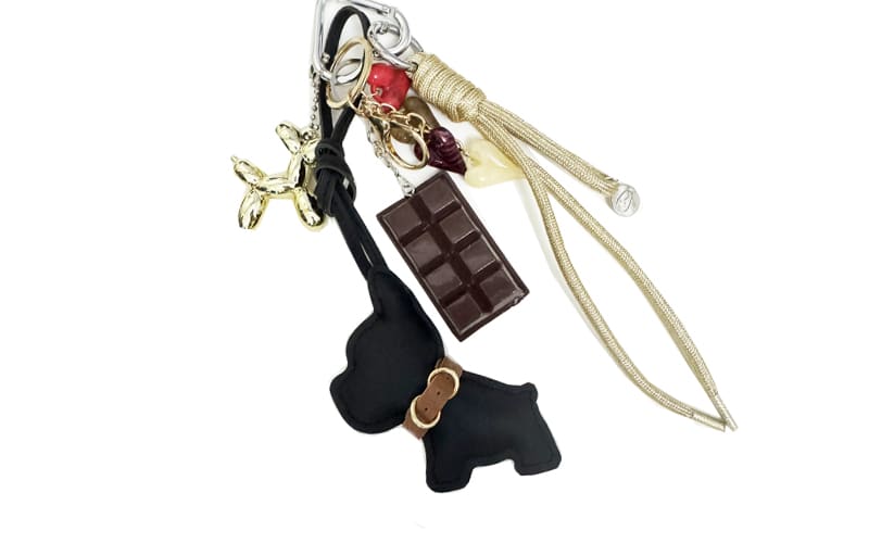 Black Freekje Schlüsselanhänger mit schwarzem Hund, Schokoriegel und Charms